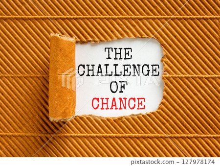 The challenge of chance symbol. Concept words phrase The challenge of chance on beautiful white paper. Beautiful brown paper background. Business The challenge of chance concept. Copy space. 127978174