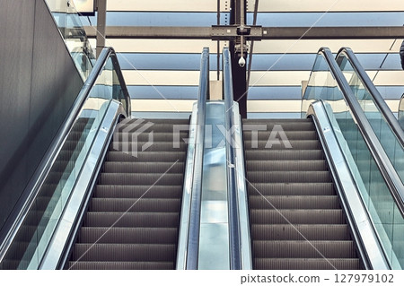 Escalator of a metro station Escalator of a metro station 127979102