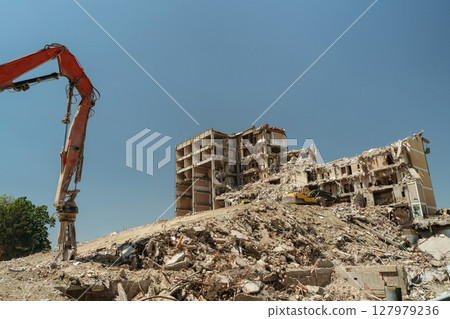 demolishing a collapsed building demolishing a collapsed building 127979236