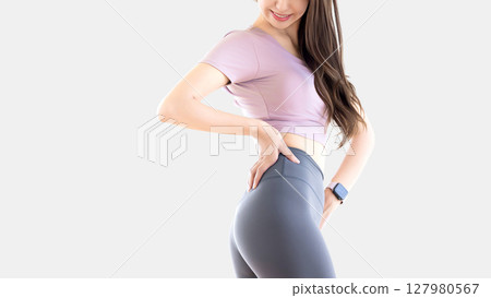 A woman checking her body line 127980567