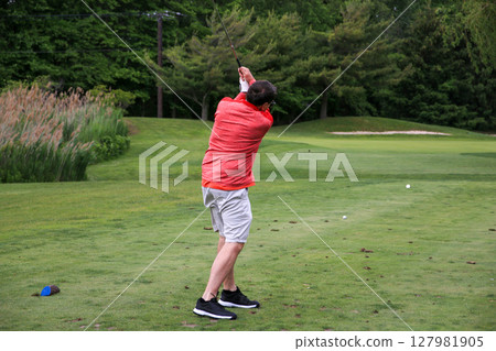 Man Playing Golf Man Playing Golf 127981905
