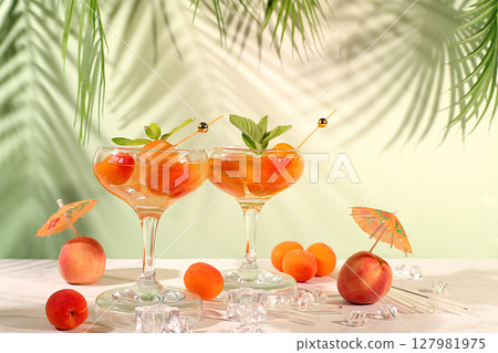 Modern still life with alcoholic cocktail or punch, peach, apricot and mint berries on elegant background, minimalist concept for bar and holiday party, cafe, advertising banner, selective focus, Modern still life with alcoholic cocktail or punch, peach, apricot and mint berries on elegant background, minimalist concept for bar and holiday party, cafe, advertising banner, selective focus, 127981975