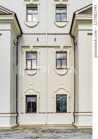 Modern buildings with big glass windows black and white small trees, good neighborhood, modern city, suburb. 127982345