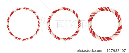 3 sweet holiday round frame elements with vintage swirl candycane shape for photo or card. Vector banner with red cane pattern and white festive background. 3 sweet holiday round frame elements with vintage swirl candycane shape for photo or card. Vector banner with red cane pattern and white festive background. 127982407