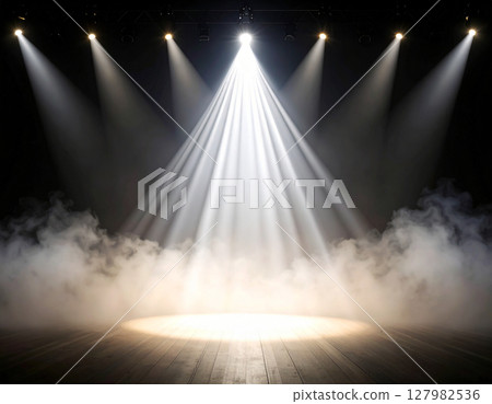 Stage illuminated by spotlights 127982536
