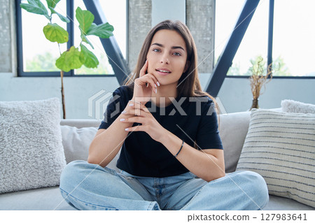 Web camera view of teenage girl talking looking in camera, online meeting, video call Web camera view of teenage girl talking looking in camera, online meeting, video call 127983641