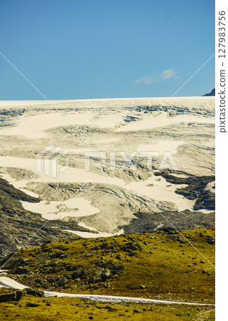 Mountains with ice glacier. Road Sognefjellet, Norway 127983756