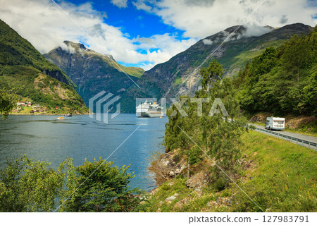 Cruise ship on fjord and camper on road, Norway. Cruise ship on fjord and camper on road, Norway. 127983791