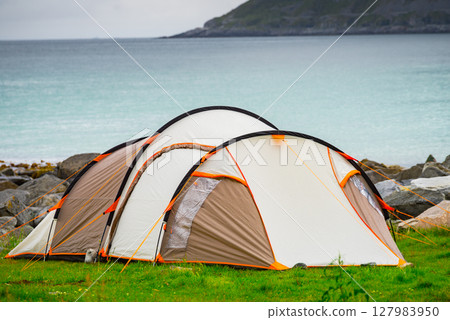 Tent on sea shore, Lofoten Norway 127983950