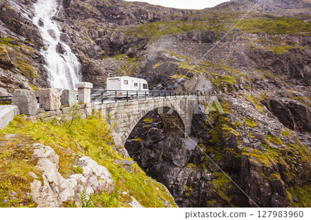 Camper car in norwegian mountains Camper car in norwegian mountains 127983960