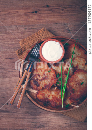 potato pancakes, pancakes with sour cream, Belarusian dish, homemade, no people, potato pancakes, pancakes with sour cream, Belarusian dish, homemade, no people, 127984172
