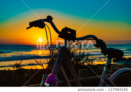 Bicycle on beach, active lifestyle. Bicycle on beach, active lifestyle. 127984280