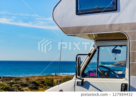 Caravan camping on sea shore, Spain Caravan camping on sea shore, Spain 127984432