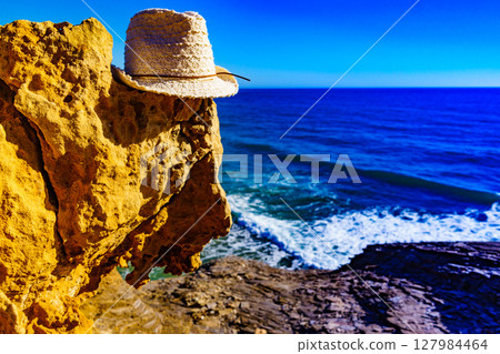 Coast landscape with summer hat, Spain. 127984464