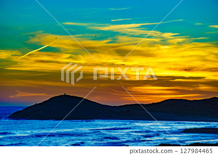 Sunset over sea, Calblanque beach, Spain Sunset over sea, Calblanque beach, Spain 127984465