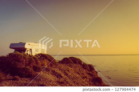Camper on cliff, coast in Spain 127984474