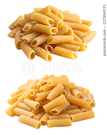 Pile of rigatoni pasta isolated, uncooked tube-shaped italian noodles Pile of rigatoni pasta isolated, uncooked tube-shaped italian noodles 127984531