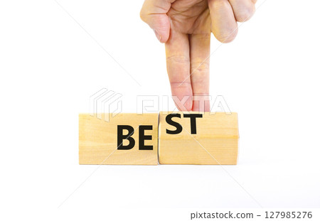 Motivational and inspirational be best symbol. Concept words Be best on beautiful wooden block. Beautiful white background Businessman hand. Business motivational be best concept. Copy space. 127985276