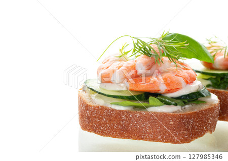 Diet sandwich with seafood on white background Diet sandwich with seafood on white background 127985346