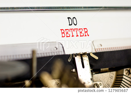 Do better symbol. Concept words Do better typed on beautiful old retro vintage typewriter. Beautiful white paper background. Business and do better concept. Copy space. Do better symbol. Concept words Do better typed on beautiful old retro vintage typewriter. Beautiful white paper background. Business and do better concept. Copy space. 127985687