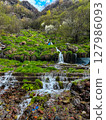 Small waterfall on the Georgian Military road. High quality photo 127986093