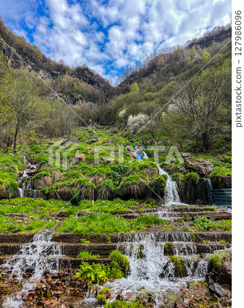 Small waterfall on the Georgian Military road. High quality photo 127986096