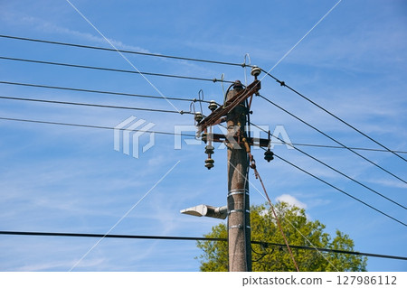 Electric line grid in a village 127986112