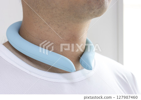 A man wearing an ice ring around his neck (no face, Japanese, 30s) A man wearing an ice ring around his neck (no face, Japanese, 30s) 127987460