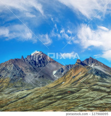 Impressive view of volcanic mountains around Skaftafellsjokull glacier 127988095