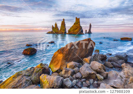 Ramarkable landscape with basalt rock formations Troll Toes on Black beach Reynisfjara near the village of Vik. 127988109