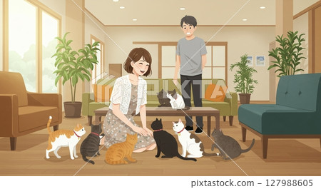 飯店住宿期間的放鬆：一位女士與貓咪互動時的微笑 127988605