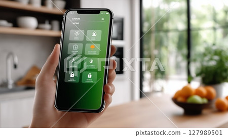 Person controlling smart home via mobile app, managing lighting, temperature, and security settings in contemporary kitchen environment with wireless technology, smart home via mobile app, 127989501