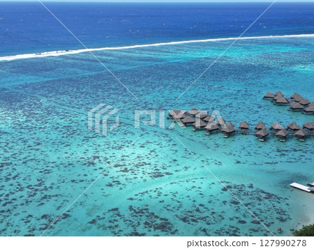 Aerial view of the beautiful lagoon sea at Manava Beach, Moorea Aerial view of the beautiful lagoon sea at Manava Beach, Moorea 127990278