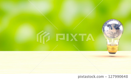 The Earth in Light bulb on black background fo Eco or energy concept 3d Rendering. The Earth in Light bulb on black background fo Eco or energy concept 3d Rendering. 127990648