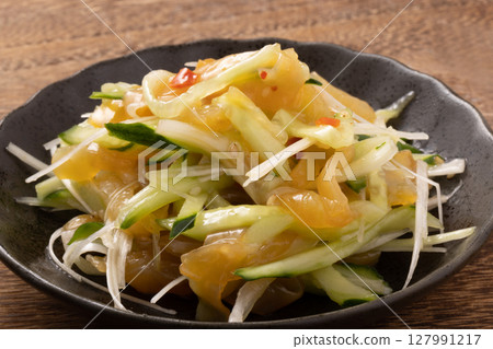 Cucumber and spring onion tossed in Chinese jellyfish sauce Cucumber and spring onion tossed in Chinese jellyfish sauce 127991217