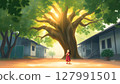 A young Thai girl stands under the tree, looking up with hands together in a respectful gesture. 127991501