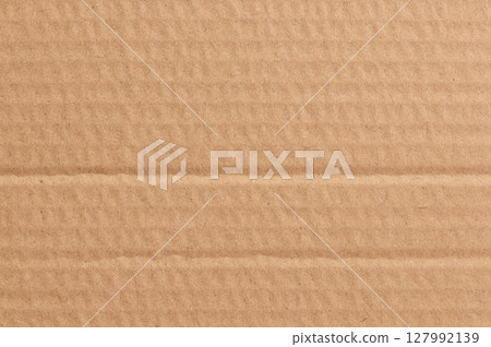 Brown cardboard sheet abstract background, texture of recycle paper box in old vintage pattern for design art work. Brown cardboard sheet abstract background, texture of recycle paper box in old vintage pattern for design art work. 127992139