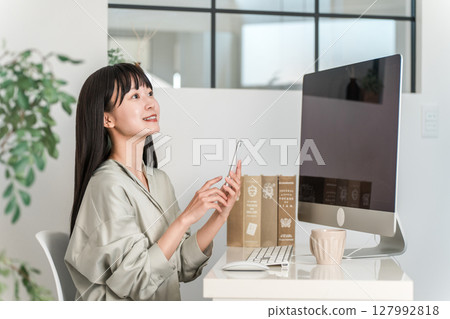 Female designers, architects and creators working in stylish offices and at home 127992818