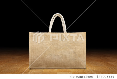 Big Shopping bags made from recycled sacks on a wooden background. 127993335