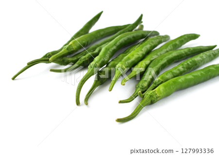 Green chili peppers (white background, copy space available) 127993336