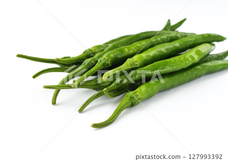 Green chili peppers (white background, copy space available) 127993392