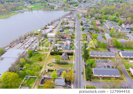 Suburban neighborhood in Jamesburg, New Jersey, street layout, residential houses, apartment complexes, urban landscape with clear road networks Suburban neighborhood in Jamesburg, New Jersey, street layout, residential houses, apartment complexes, urban landscape with clear road networks 127994458