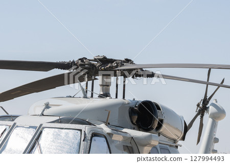 Helicopter rotor blades on technology background 127994493