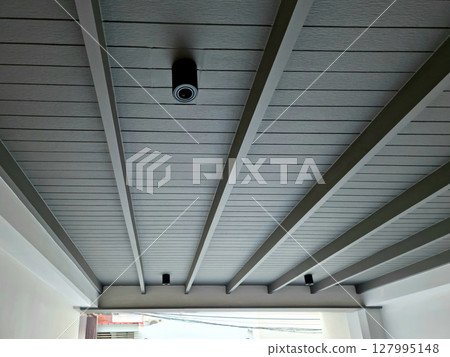 Gray wooden frame with lamp 127995148