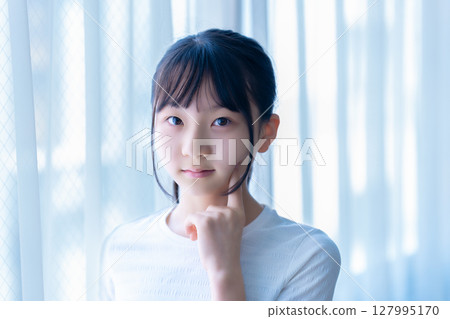 Girl doing face care 127995170