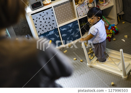 Mom Is Looking At Her Child Made A Mess In The Room, Background for advertising and wallpaper in education and lifestyle scene. 127996503