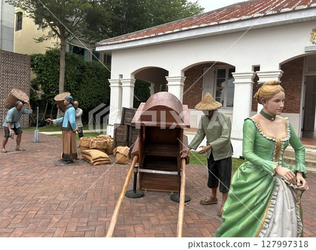 These are many wax figures in the garden in front of the British Consulate at Takao in Kaohsiung City, Taiwan. These are many wax figures in the garden in front of the British Consulate at Takao in Kaohsiung City, Taiwan. 127997318