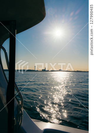 Sunset seen from the ship 127998485