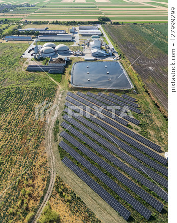Aerial view of biogas plant using renewable energy for biomethane production. Aerial view of biogas plant using renewable energy for biomethane production. 127999299
