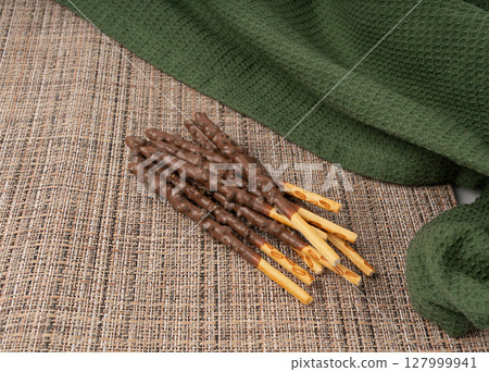 Chocolate cookie sticks, long choco pastries, japan biscuit tubes, korea cracker sticks 127999941